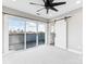 Bedroom with sliding glass doors to a private deck at 1927 W Trade St, Charlotte, NC 28216