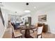 Elegant dining area with a round wooden table and modern chairs at 1927 W Trade St, Charlotte, NC 28216