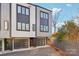 Modern townhome with attached garage and private driveway at 1927 W Trade St, Charlotte, NC 28216