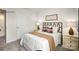 Well-lit bedroom with double bed and neutral decor at 202 Brinkley Dr # 11, Kings Mountain, NC 28086