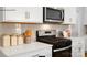 Kitchen features gas range and stainless steel microwave at 202 Brinkley Dr # 11, Kings Mountain, NC 28086
