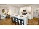 Modern kitchen with island, stainless steel appliances, and white cabinets at 202 Brinkley Dr # 11, Kings Mountain, NC 28086