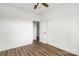 Clean bedroom featuring modern wood-look floors and a door leading to additional spaces, offering a versatile layout at 244 Little Wilkesboro Rd, Harmony, NC 28634