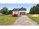 New construction home with a modern design, and a two-car garage is under construction at 244 Little Wilkesboro Rd, Harmony, NC 28634