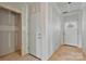 Unfinished hallway shows several closed and open doorways and an unfinished floor at 244 Little Wilkesboro Rd, Harmony, NC 28634