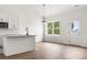 Eat in kitchen features white cabinets, granite countertops and stainless appliances at 244 Little Wilkesboro Rd, Harmony, NC 28634