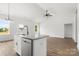 Stylish kitchen island featuring granite countertops, modern sink, and stainless steel appliances in an open floor plan at 244 Little Wilkesboro Rd, Harmony, NC 28634