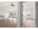 Bright and airy living room with wood-look floors and an open floor plan at 244 Little Wilkesboro Rd, Harmony, NC 28634