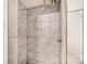 Clean shower with marble-style wall tiles at 2617 Fairgreen Dr, Gastonia, NC 28056