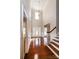 Spacious entryway with hardwood floors, a grand staircase, and a chandelier at 3529 Cameron Creek Dr, Matthews, NC 28105