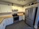 Modern kitchen with stainless steel appliances and butcher block countertops at 4020 Brandie Glen Rd, Charlotte, NC 28269