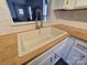 Modern kitchen sink with butcher block countertops and a sleek faucet at 4020 Brandie Glen Rd, Charlotte, NC 28269