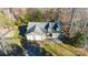 Aerial view of house, showcasing its two-car garage and yard at 412 Wildlife Rd, Troutman, NC 28166