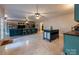 Open concept basement featuring a living area and kitchenette at 412 Wildlife Rd, Troutman, NC 28166
