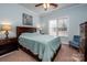 Cozy bedroom with a queen-size bed and a window seat at 412 Wildlife Rd, Troutman, NC 28166