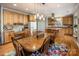 Well-equipped kitchen with ample cabinetry, large island, and hardwood floors at 412 Wildlife Rd, Troutman, NC 28166