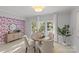 Charming dining area with floral wallpaper and a round table at 5204 Sardis Rd, Charlotte, NC 28270