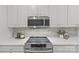 Sleek kitchen with stainless steel appliances and white cabinets at 5204 Sardis Rd, Charlotte, NC 28270
