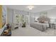 Spacious main bedroom with large bed and calming decor at 5204 Sardis Rd, Charlotte, NC 28270