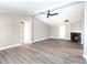 Open living room with vaulted ceiling and ceiling fan at 5411 Mcwhorter Rd, Waxhaw, NC 28173