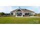 Community clubhouse with covered patio and landscaping at 564 Zermatt Ct, Monroe, NC 28112