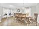 Elegant dining room with rustic farmhouse table and chairs at 5715 Hammermill Dr, Harrisburg, NC 28075