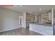 Kitchen and dining area with island and hardwood floors at 8024 Kennesaw Dr, Gastonia, NC 28056
