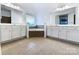Bathroom with double vanity, corner tub, and tile floors at 8331 Burgundy Ridge Dr, Harrisburg, NC 28075
