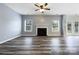 Living room featuring a fireplace and hardwood floors at 8331 Burgundy Ridge Dr, Harrisburg, NC 28075