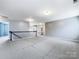 Spacious upper hallway with access to bedrooms and bathroom at 8331 Burgundy Ridge Dr, Harrisburg, NC 28075