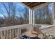 Private deck with scenic wooded views and bistro set at 8938 Rosalyn Glen Rd, Cornelius, NC 28031