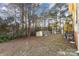 Backyard with shed and mature trees at 9 Post Oak Pl, Salisbury, NC 28147