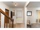 Entryway with mirror, coat rack, and carpeted floor at 9 Post Oak Pl, Salisbury, NC 28147