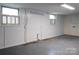 Spacious basement with painted walls and floors and utility connections at 1035 Timberlane Dr, Lincolnton, NC 28092