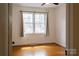 Cozy bedroom with hardwood floors, a large window, and neutral paint at 1035 Timberlane Dr, Lincolnton, NC 28092