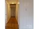 Hallway featuring hardwood floors and a closet at 1035 Timberlane Dr, Lincolnton, NC 28092