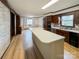 Bright eat-in kitchen featuring wooden cabinets, a large island, and modern appliances at 1035 Timberlane Dr, Lincolnton, NC 28092