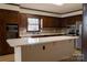 Well-equipped kitchen featuring stainless steel appliances, custom cabinets, and island seating at 1035 Timberlane Dr, Lincolnton, NC 28092