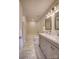 Bathroom with double vanity, marble floors, and a bathtub at 105 Fleishhacker Pl, Mooresville, NC 28117