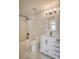 Bathroom with white vanity, bathtub, and tiled floor at 105 Fleishhacker Pl, Mooresville, NC 28117