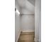 Small reach-in closet with wire shelving and light wood flooring at 105 Fleishhacker Pl, Mooresville, NC 28117
