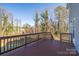 Spacious deck with wooden railings and backyard view at 105 Fleishhacker Pl, Mooresville, NC 28117