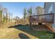 Wooden deck overlooking backyard and trees at 105 Fleishhacker Pl, Mooresville, NC 28117