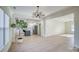 Spacious dining room with hardwood floors and a chandelier at 105 Fleishhacker Pl, Mooresville, NC 28117
