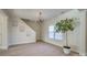 Bright dining room with hardwood floors and a large window at 105 Fleishhacker Pl, Mooresville, NC 28117