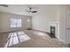 Living room with hardwood floors and fireplace at 105 Fleishhacker Pl, Mooresville, NC 28117