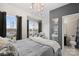 Bedroom with gray walls and en suite bathroom at 224 Parkwood Ave, Charlotte, NC 28206