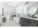 Bathroom with soaking tub and double vanity at 235 Goldenrod Cir, Salisbury, NC 28147