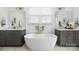 Bathroom with double vanity and free-standing tub at 235 Goldenrod Cir, Salisbury, NC 28147