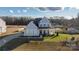 Two-story house with gray siding, white trim, and a covered porch at 235 Goldenrod Cir, Salisbury, NC 28147